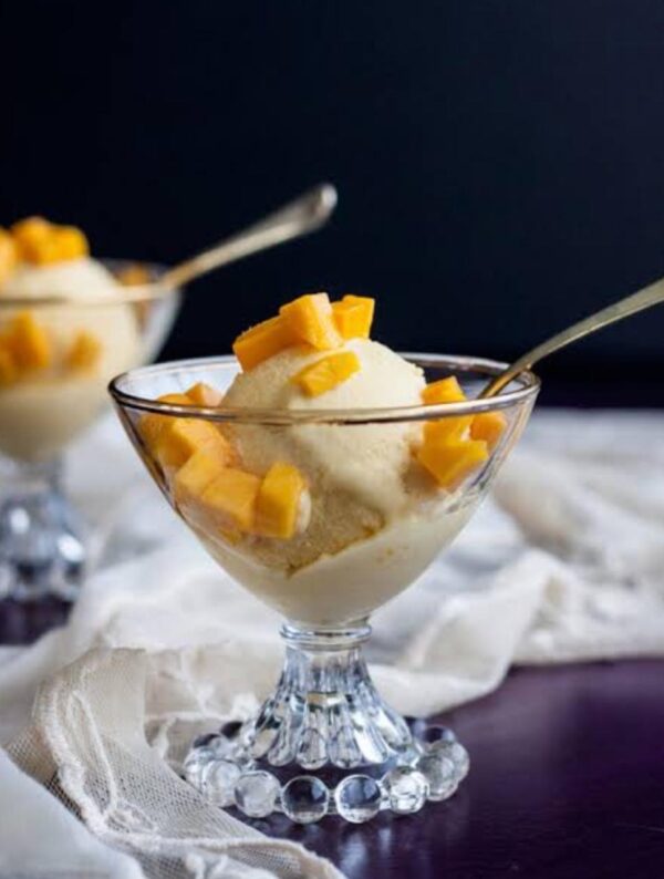 Ice cream toped with Fruits